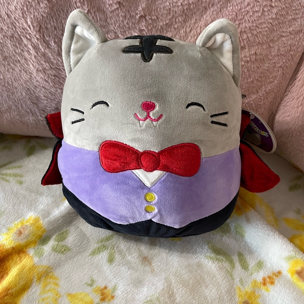 Squishmallows Tally Cat Plush with Red Bow and Purple Vest